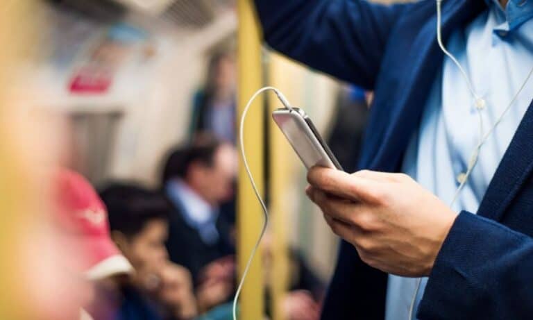 Man on Commute Listening to Podcast