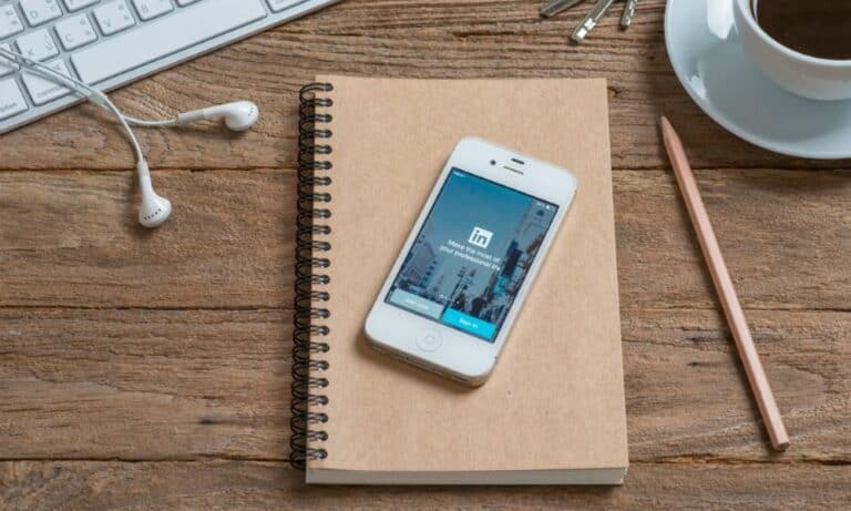 Phone with LinkedIn on screen