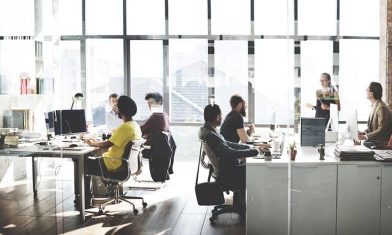 Teams collaborating at work in the office