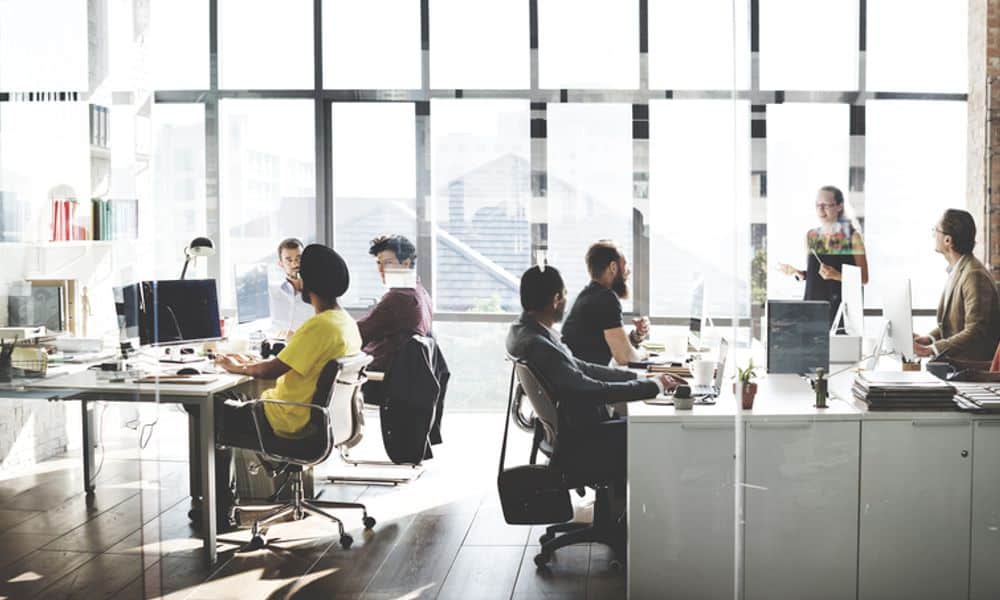 Teams collaborating at work in the office