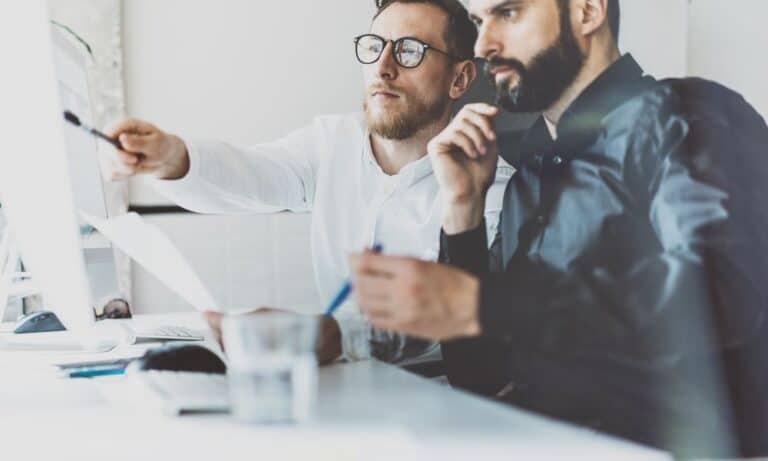 Project Managers discuss Project in Office