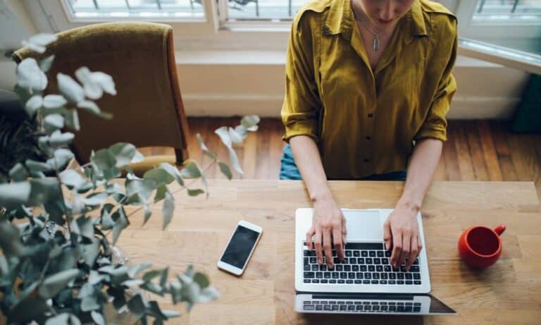 Woman looking for freelance jobs on her computer