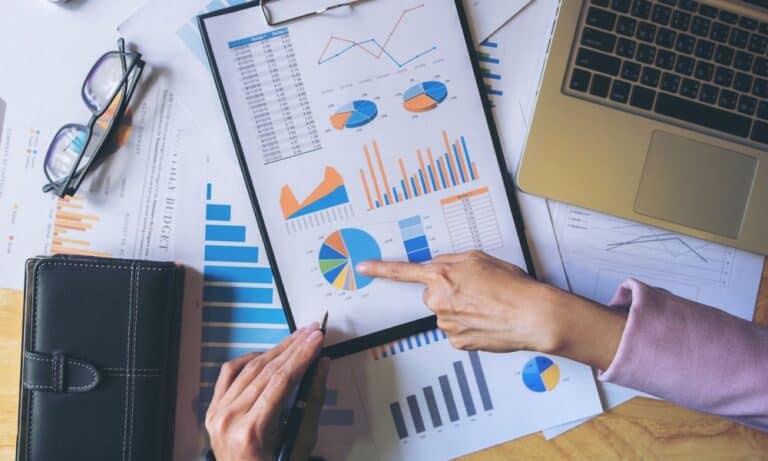 Employee analyzing data at desk