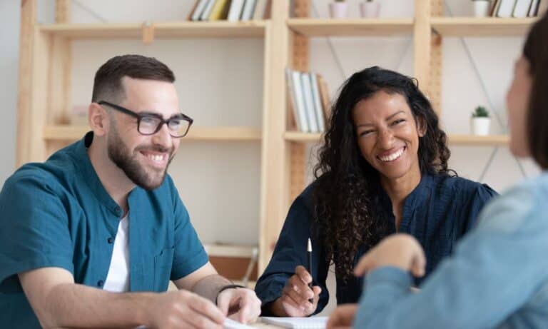 Employees chatting during meeting