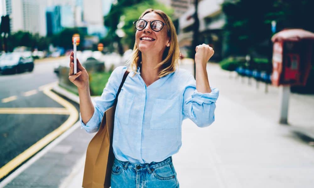 Woman excited to receive a job offer