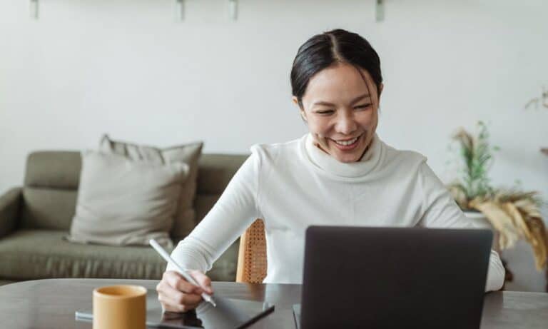 Woman working from home on computer