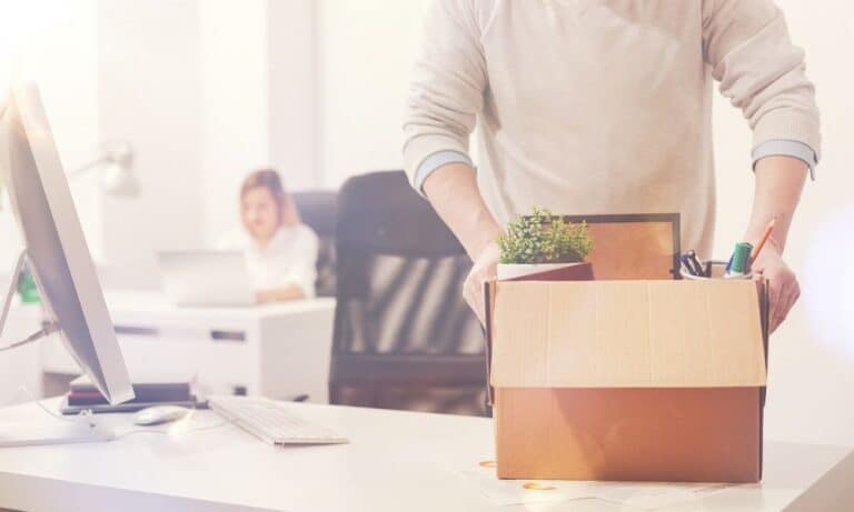 Employee packing up desk