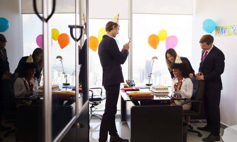 Co-workers celebrating a team member's birthday