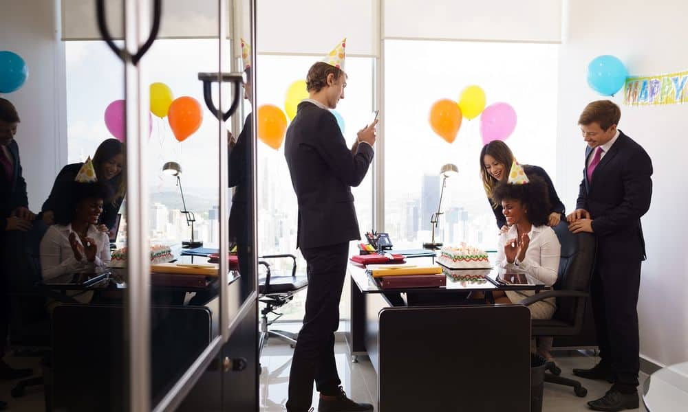 Co-workers celebrating a team member's birthday