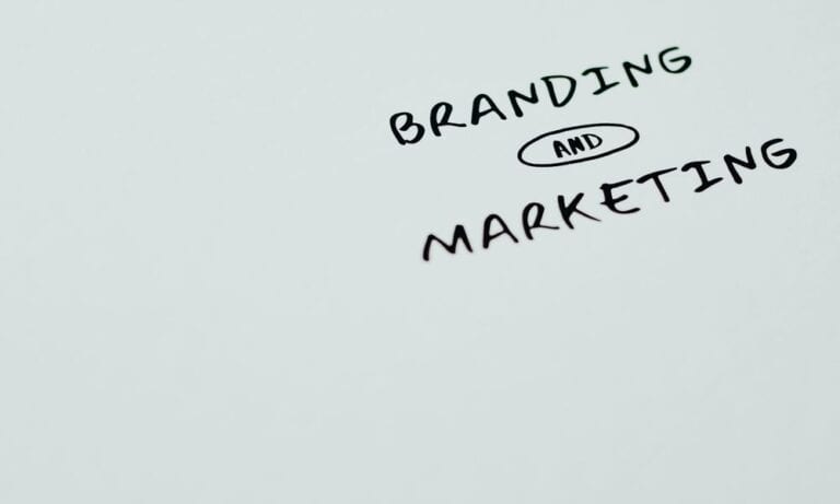 Brand and marketing written on a whiteboard.