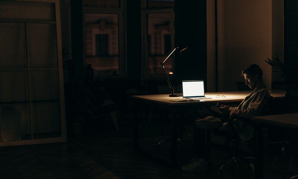 Photo of an employee not focused on their work.