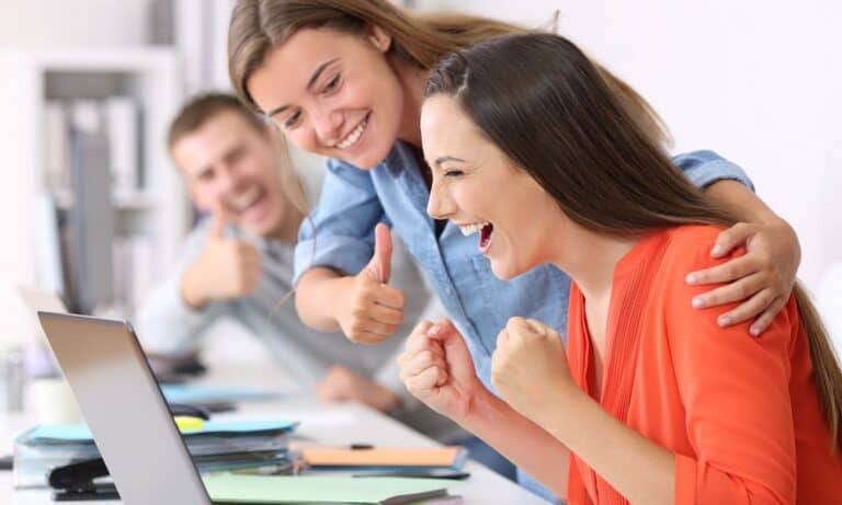 Team celebrates win at work