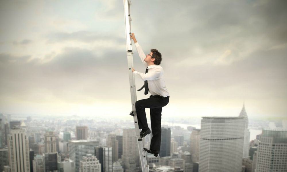 Man Climbing the Corporate Ladder