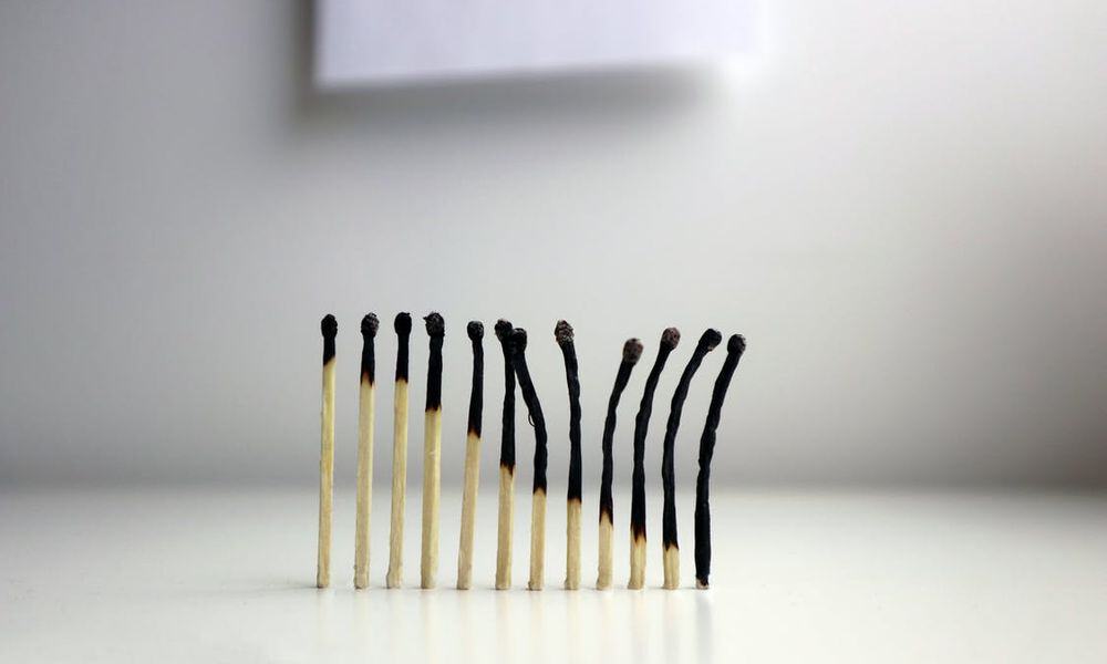 Photo of matches burning out.