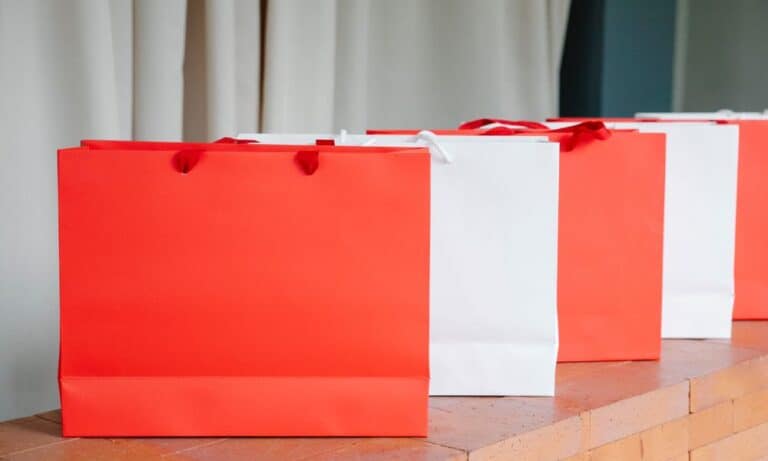 Photo of red and white gift bags.