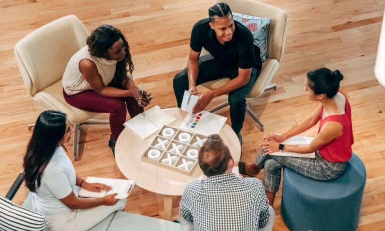 Photo of a team having a group discussion.