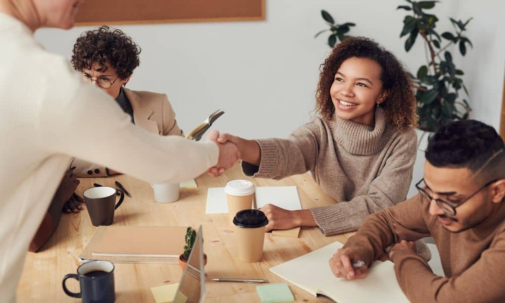 Photo of a team onboarding a new employee.