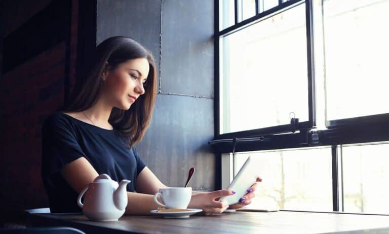 Woman reading on her iPad