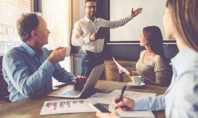 Man giving presentation to team