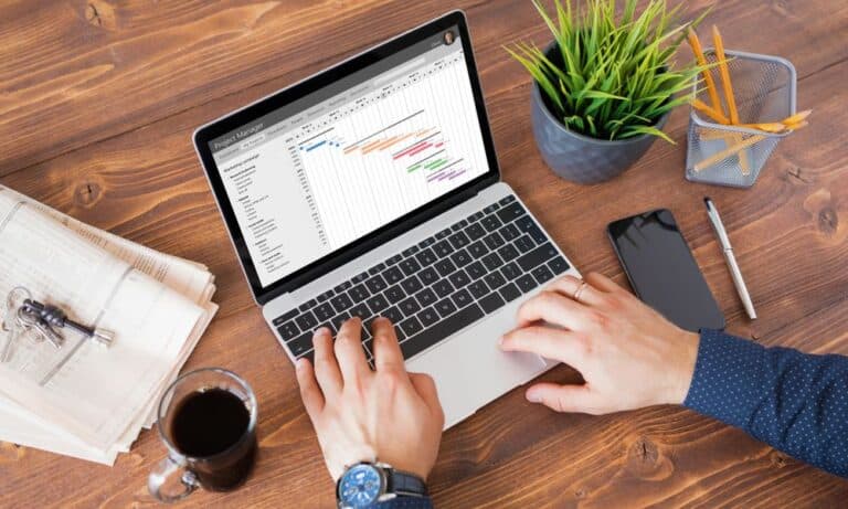 Photo of a CRM manager utilizing a job seerker's toolkit.