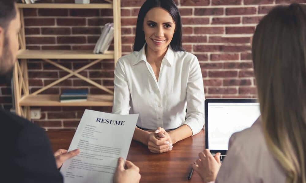 Photo of an employee in an interview.