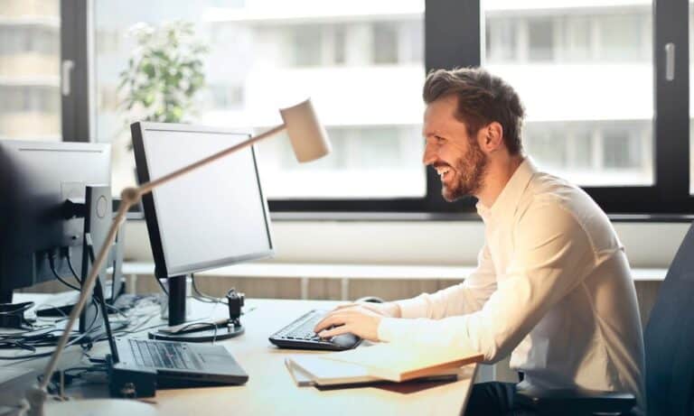 Photo of an employee using job search tips.