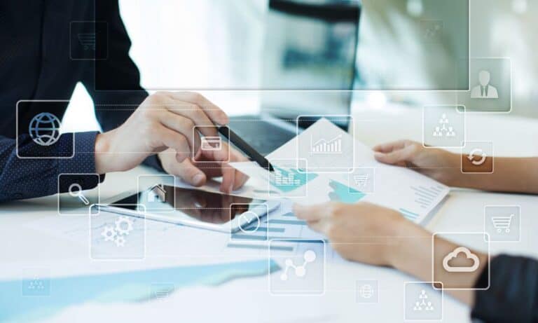 Photo of employees utilizing a data scientists toolkit.