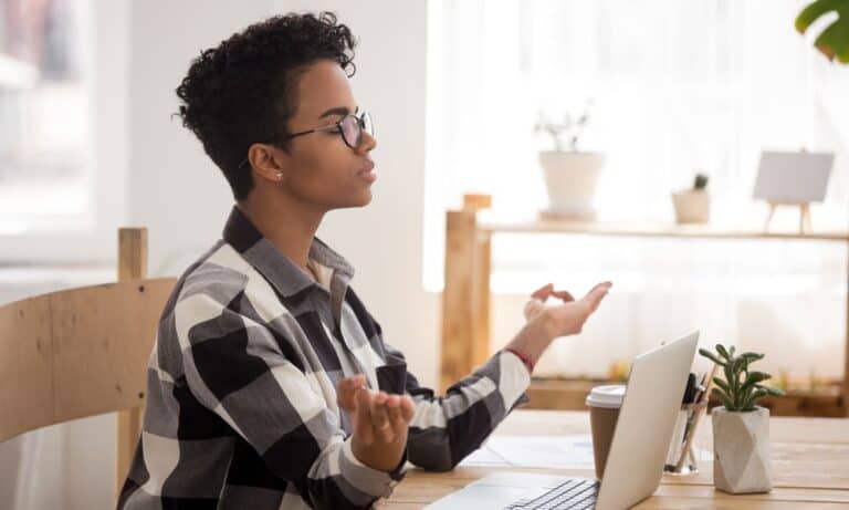 Photo of an employee managing their mental health at home.