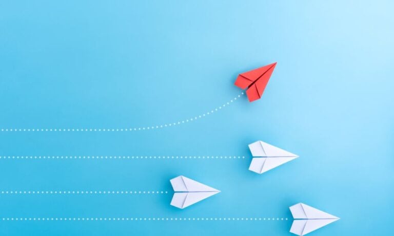 Photo of paper airplanes representing a career pivot.