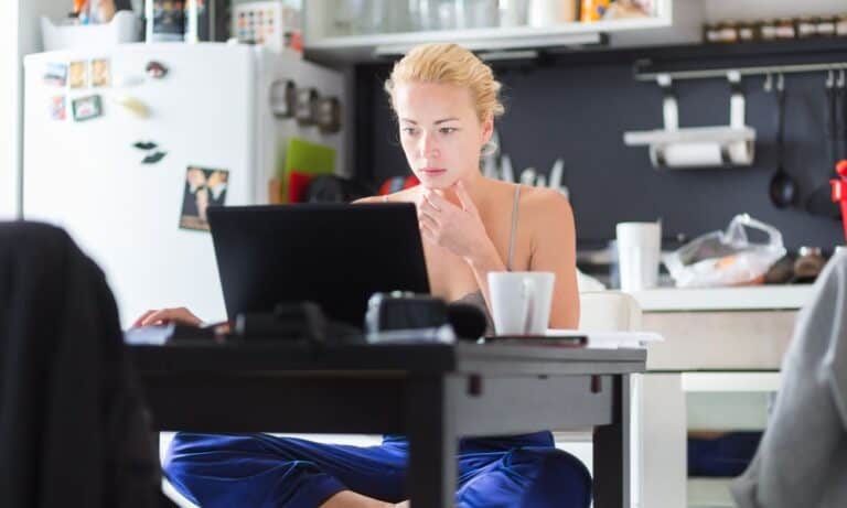 Photo of an employee working from home with best practices.