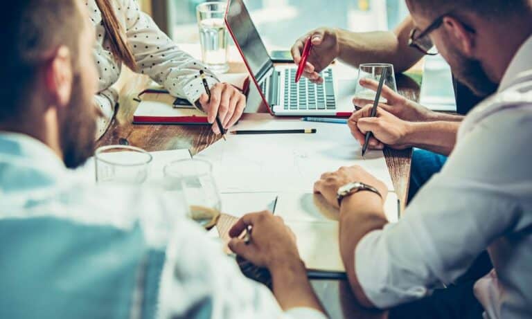People working around a table