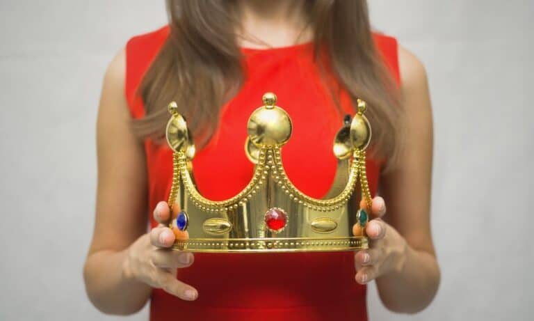 Woman holding crown