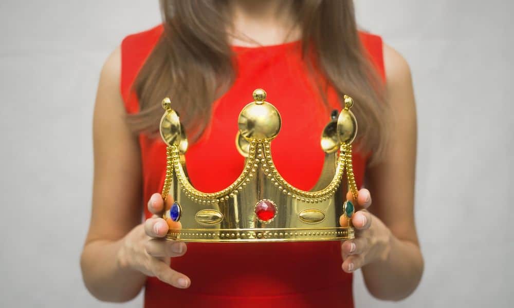 Woman holding crown