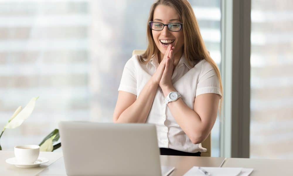 Woman receives good news via email