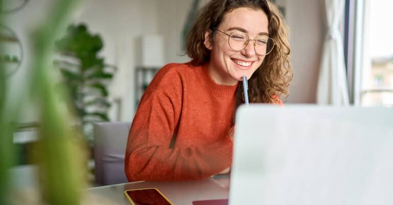 Smiling employee, working from home