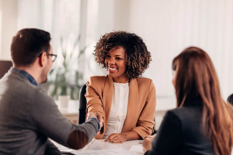 Photo of business people shaking hands after an interview.